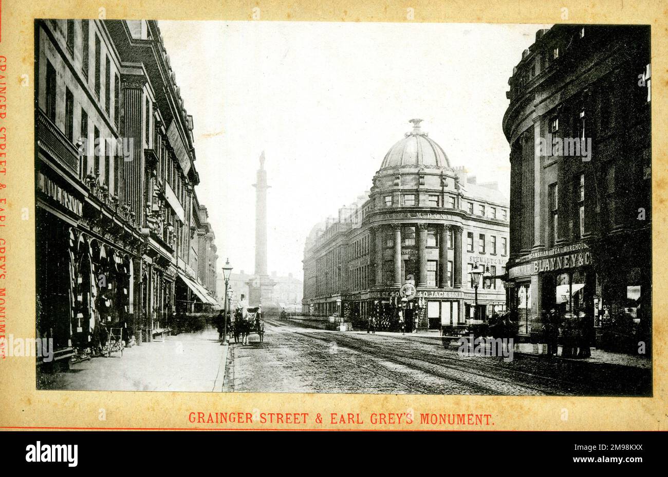 Newcastle upon Tyne - Grainger Street e Earl Grey's Monument. Foto Stock