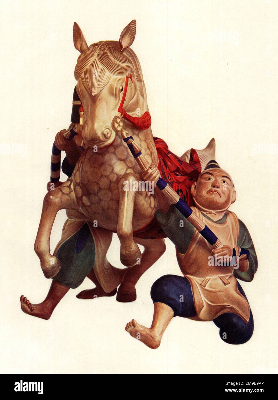 Cavallo Sacro e assistenti di ceramica Bizen Giapponese - articolo di terracotta risalente agli inizi del 18th ° secolo, quando i forni sono stati stabiliti a Korakuen per la cottura di ceramica. C'è un senso di movimento nel pezzo, con gli assistenti che cercano di controllare il giovane cavallo boisterous. Foto Stock
