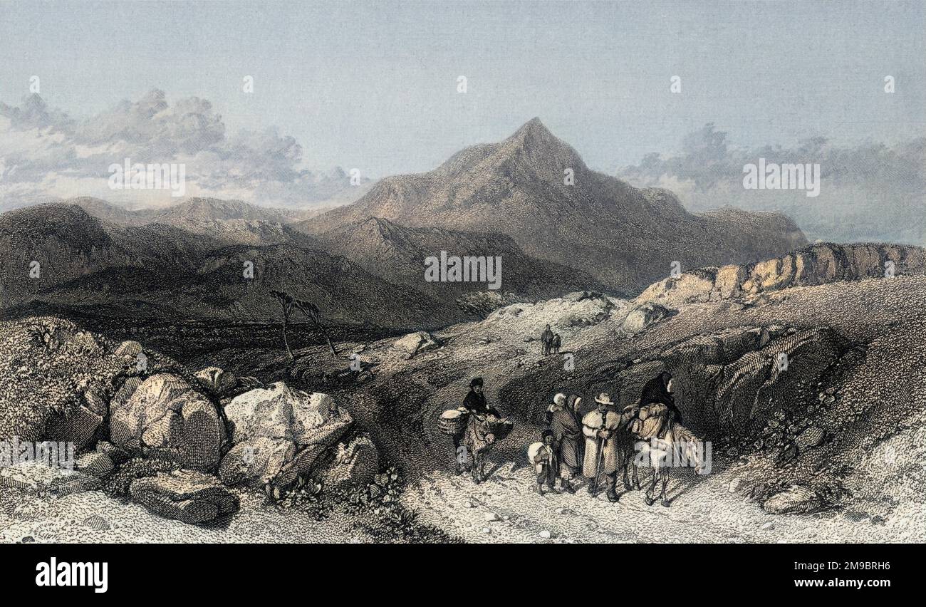 Skiddaw, Cumbria : un gruppo di viaggiatori in primo piano. Foto Stock