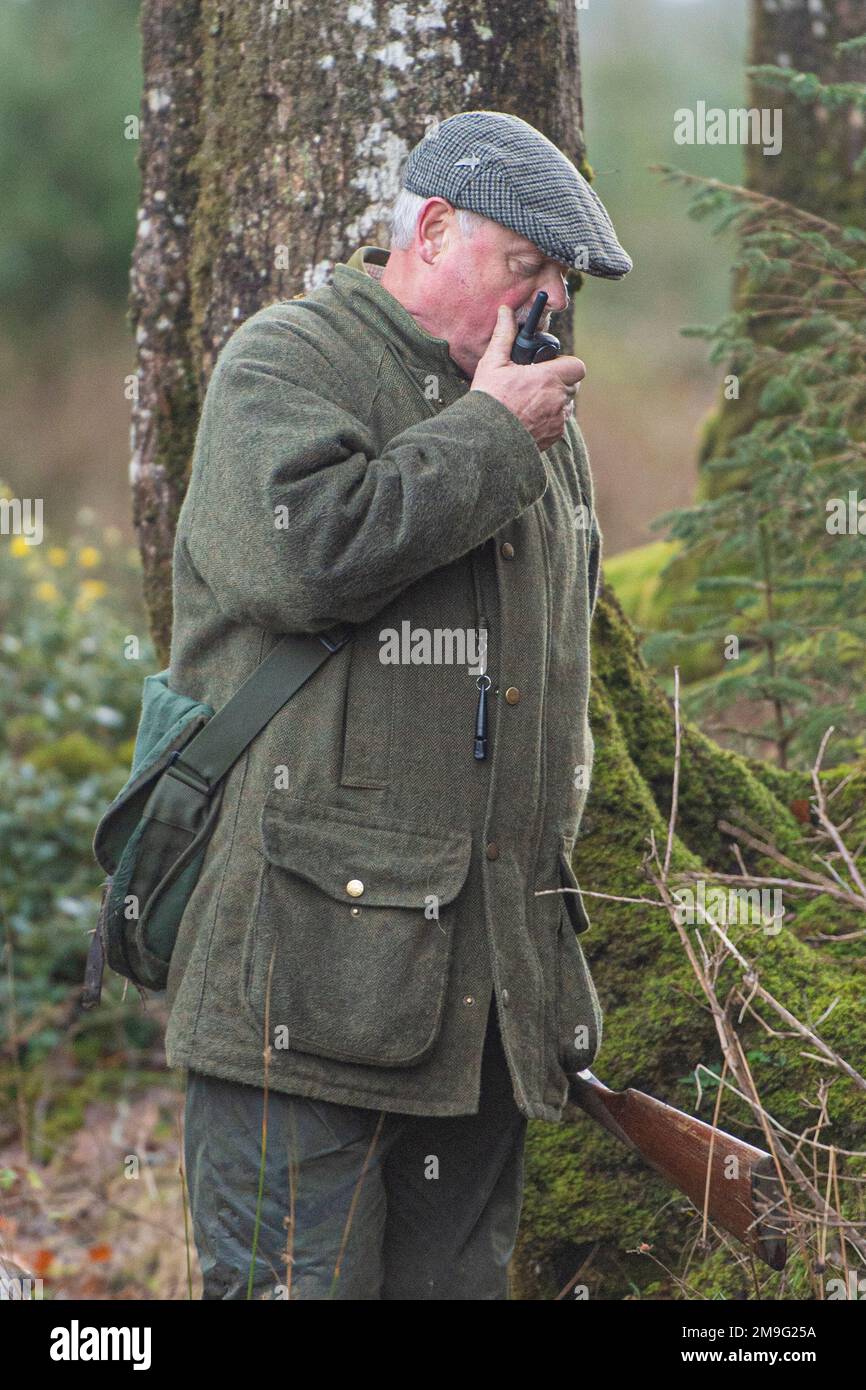 spara capitano alla radio Foto Stock