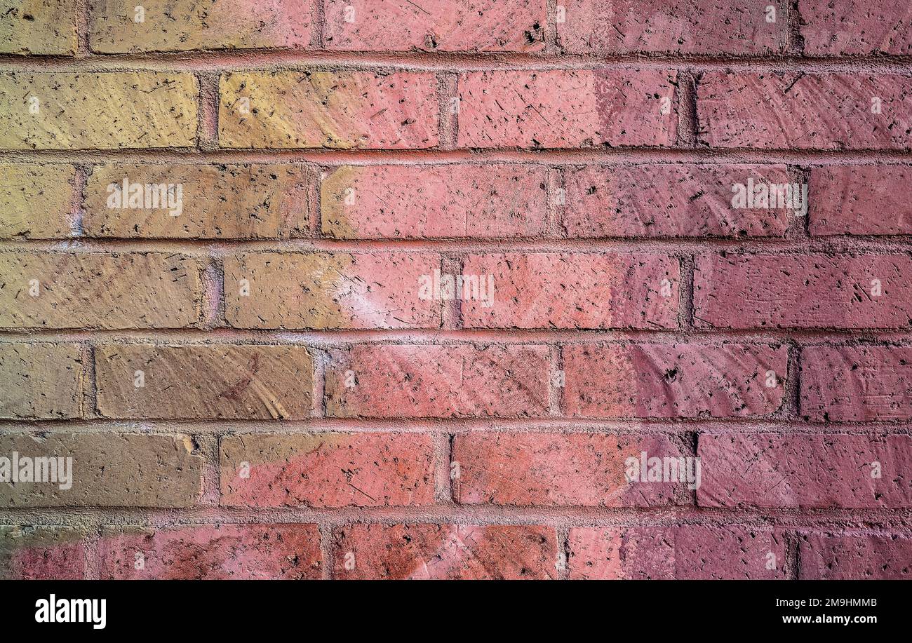 Primo piano del muro di mattoni dipinti Foto Stock