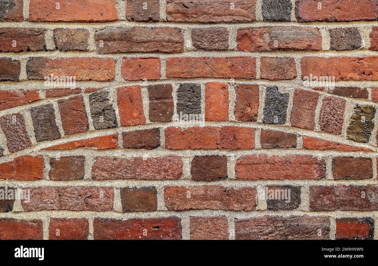 Close-up di rosso la parete in mattoni Foto Stock