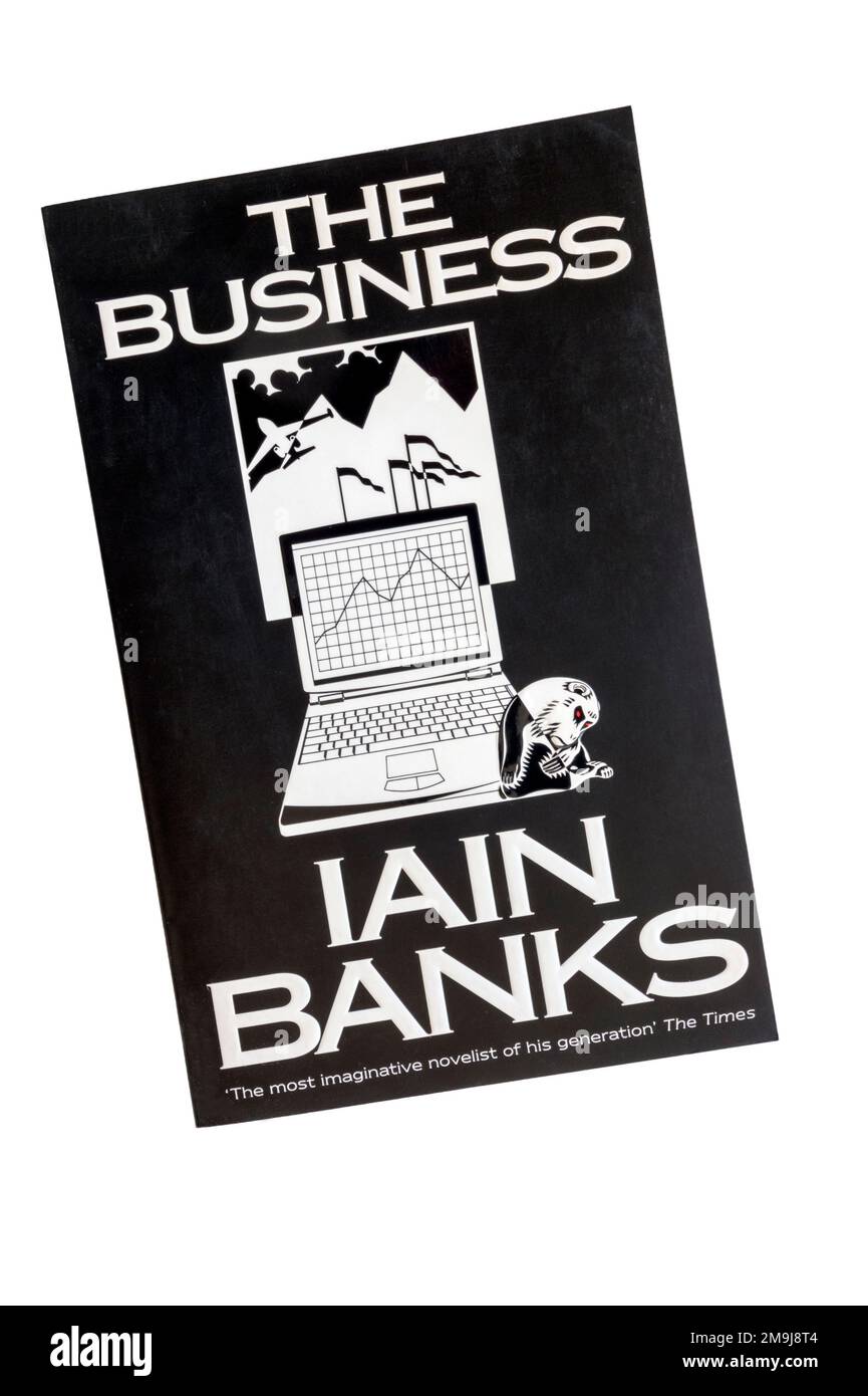 Una copia cartacea del Business di Iain Banks. Pubblicato per la prima volta nel 1999. Foto Stock