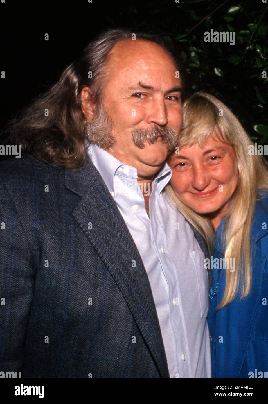 **FOTO DEL FILE** David Crosby è passato via. David Crosby e Jan Dance circa 90's Credit: Ralph Dominguez/MediaPunch Foto Stock