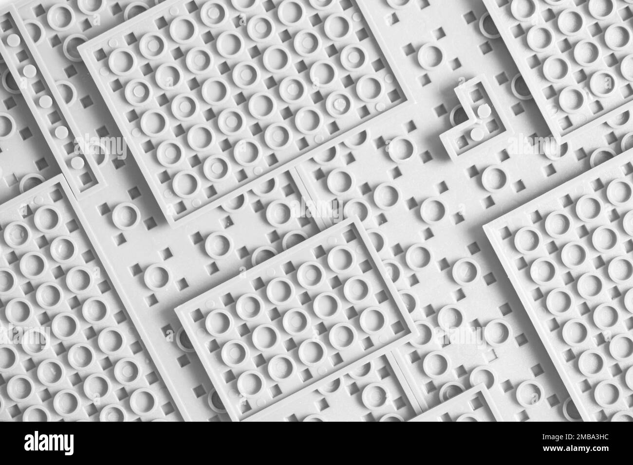 Sfondo astratto rilievo, texture bambini bianchi. Foto Stock