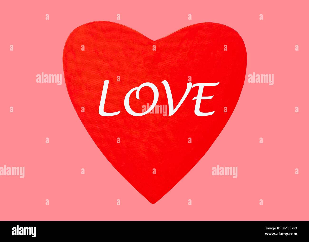 Parola D'AMORE su cuore rosso su sfondo rosa per buon giorno di San Valentino, 14 febbraio. Foto di alta qualità Foto Stock