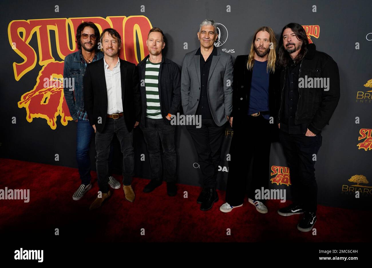 Foo Fighters band members and "Studio 666" cast members, from left