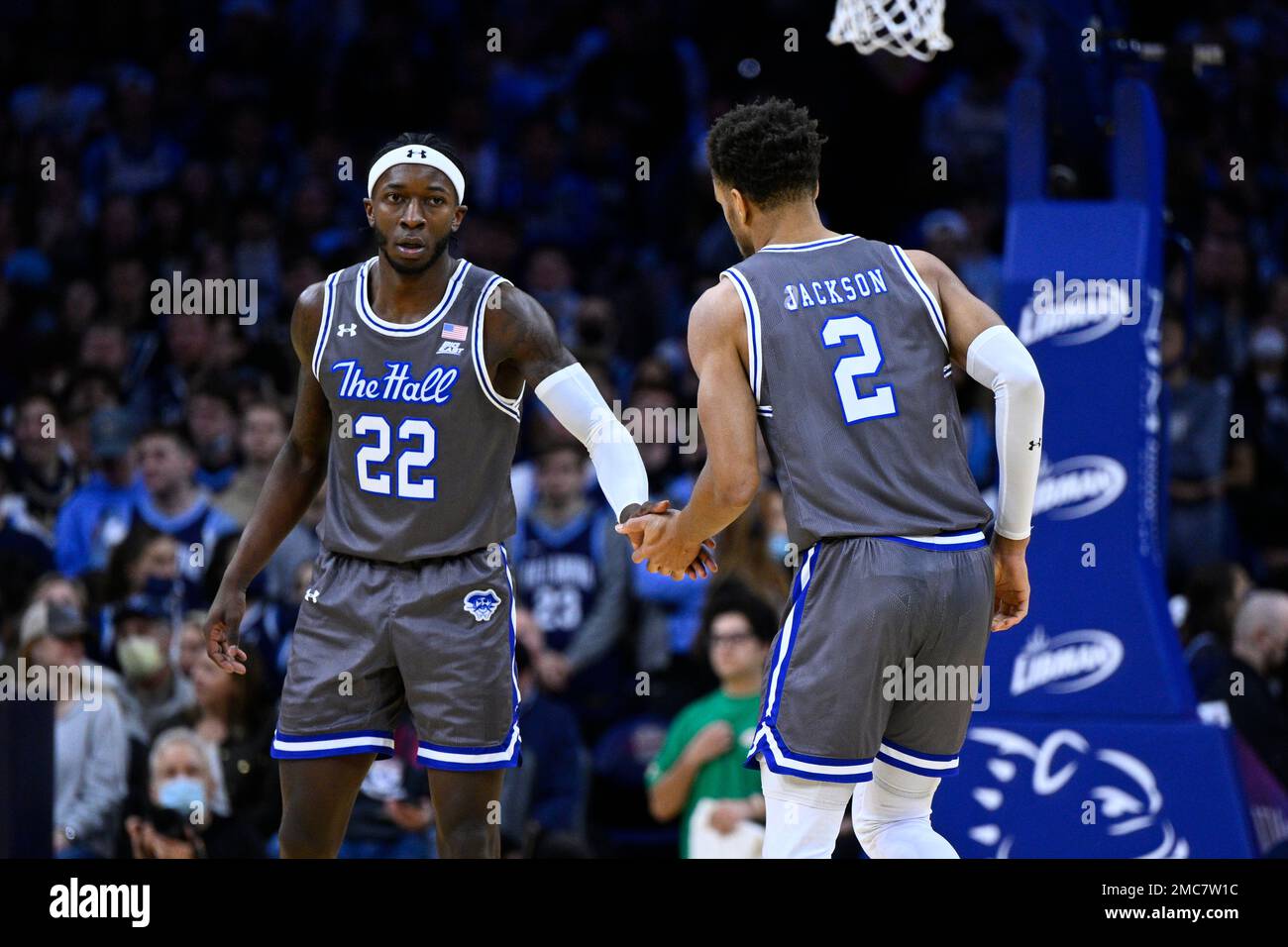 Seton Hall's Myles Cale (22) highfives Tray Jackson during an NCAA