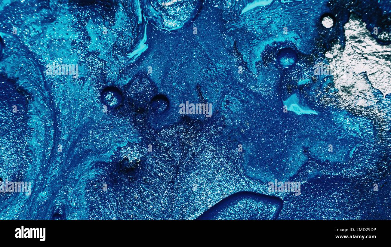 fluido arte astratto sfondo glitter inchiostro blu mix Foto Stock