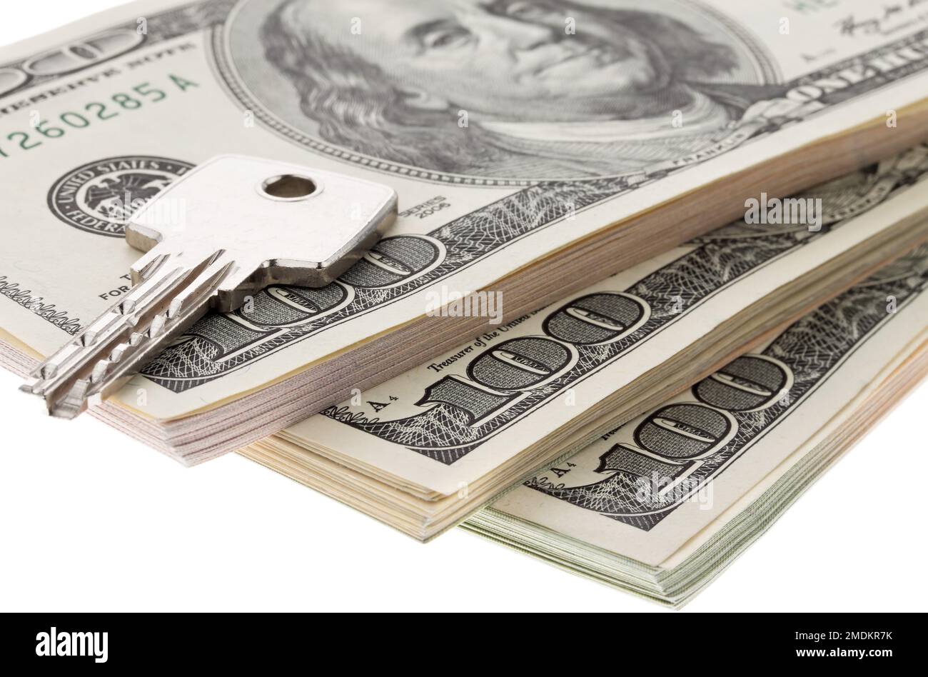Chiave di una cassaforte sulle fatture del dollaro, taglio Foto Stock