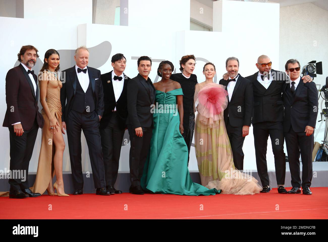 Javier Bardem, from left, Zendaya, Stellan Skarsgard, Chang Chen, Oscar Isaac, Sharon Duncan Brewster, Timothee Chalamet, Rebecca Ferguson, Denis Villeneuve, Dave Bautista and Josh Brolin pose for photographers upon arrival at the premiere of the film 'Dune' during the 78th edition of the Venice Film Festival in Venice, Italy, Friday, Sep, 3, 2021. (Photo by Joel C Ryan/Invision/AP) Foto Stock
