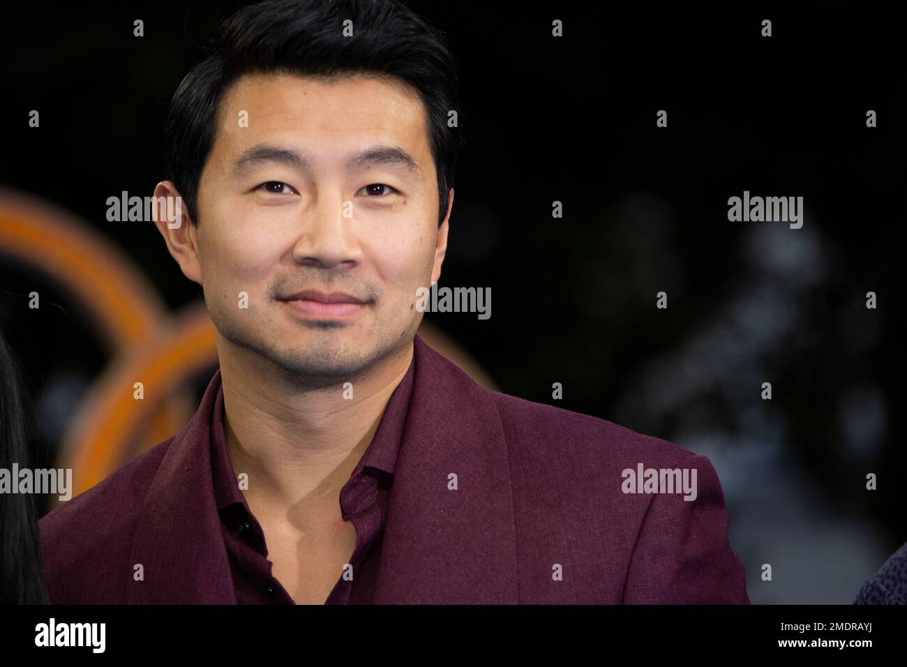 Actor Simu Liu poses for photographs on the red carpet for the premiere of Shang-Chi and the Legend of the Ten Rings, the first Marvel film to feature an Asian superhero as the lead character, at a cinema in west London, Thursday, Aug 26, 2021. (Photo by Joel C Ryan/Invision/AP) Foto Stock