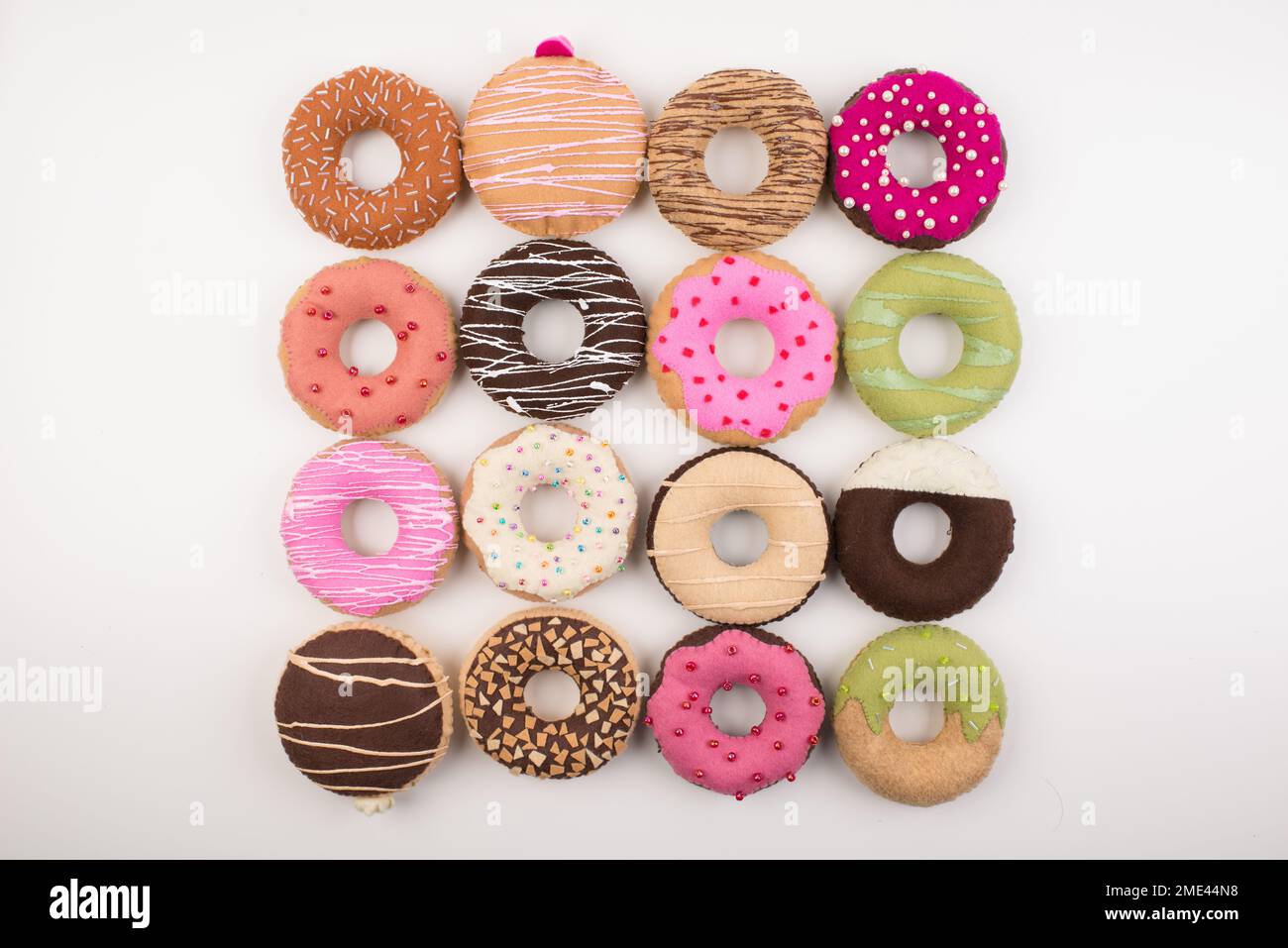 Ciambelle in feltro fatte a mano Foto Stock