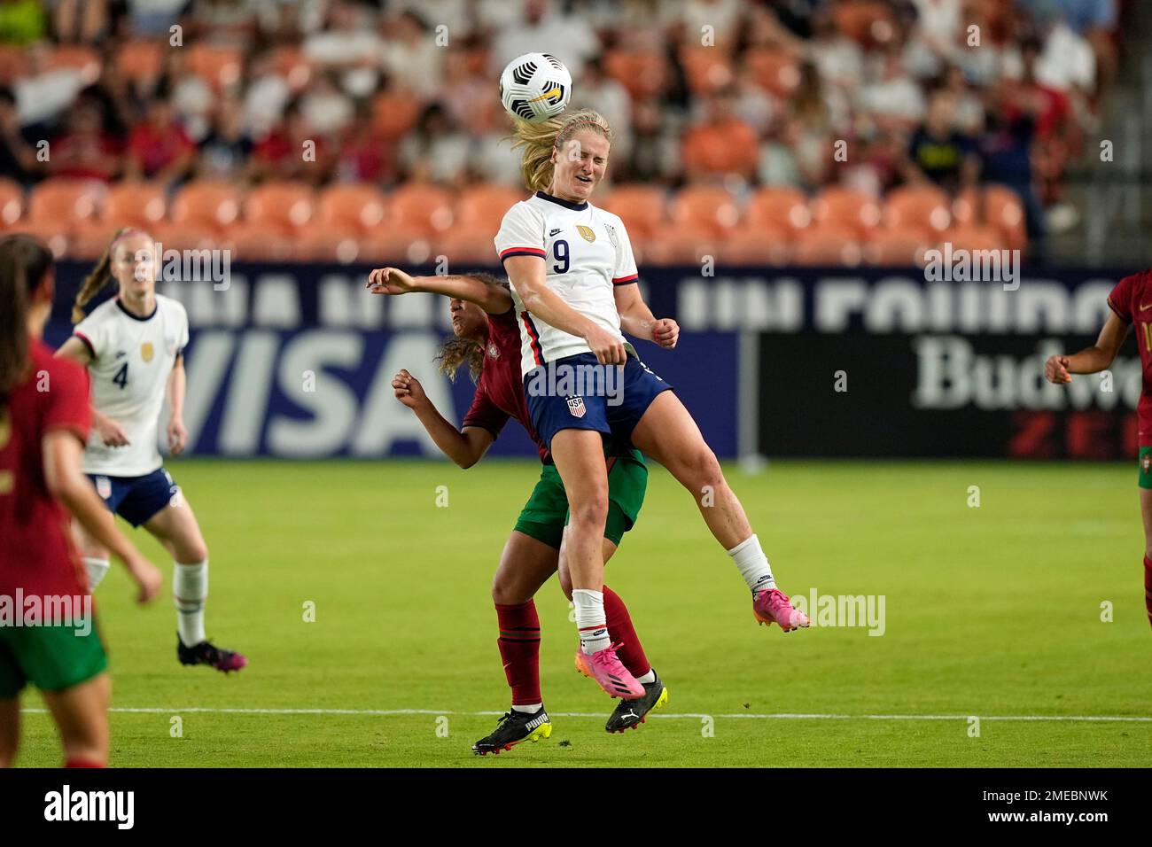 United States' Lindsey Horan (9) goes up for a head against Portugal during the second half of an international friendly soccer match Thursday, June 10, 2021, in Houston. (AP Photo/David J. Phillip) Foto Stock