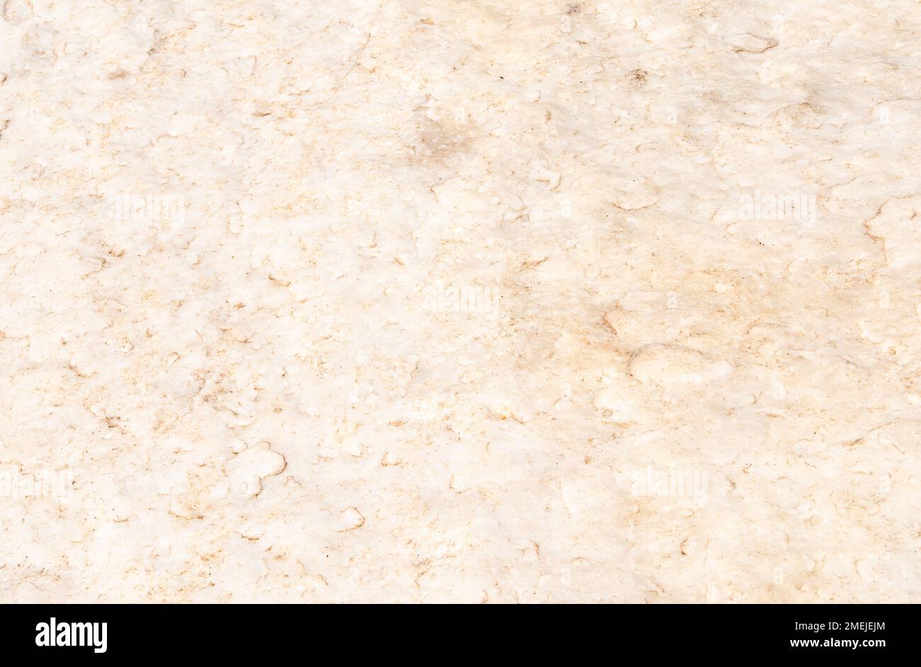 Motivo di sfondo beige con texture in marmo ruvida ad alta risoluzione. Foto Stock