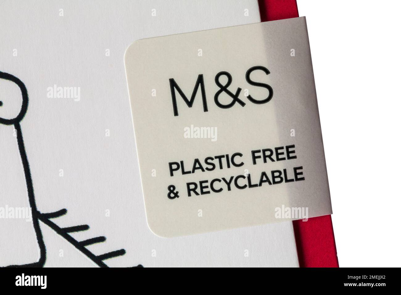 Adesivo M&S Plastic Free & riciclabile applicato intorno al biglietto di auguri per tenere la busta in posizione anziché la confezione in cellophane Foto Stock