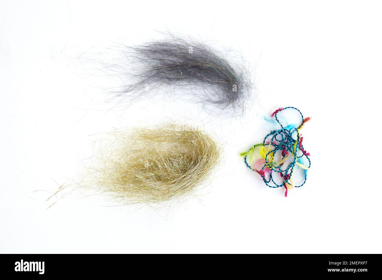 Scarti di filati e fibre colorate Foto Stock