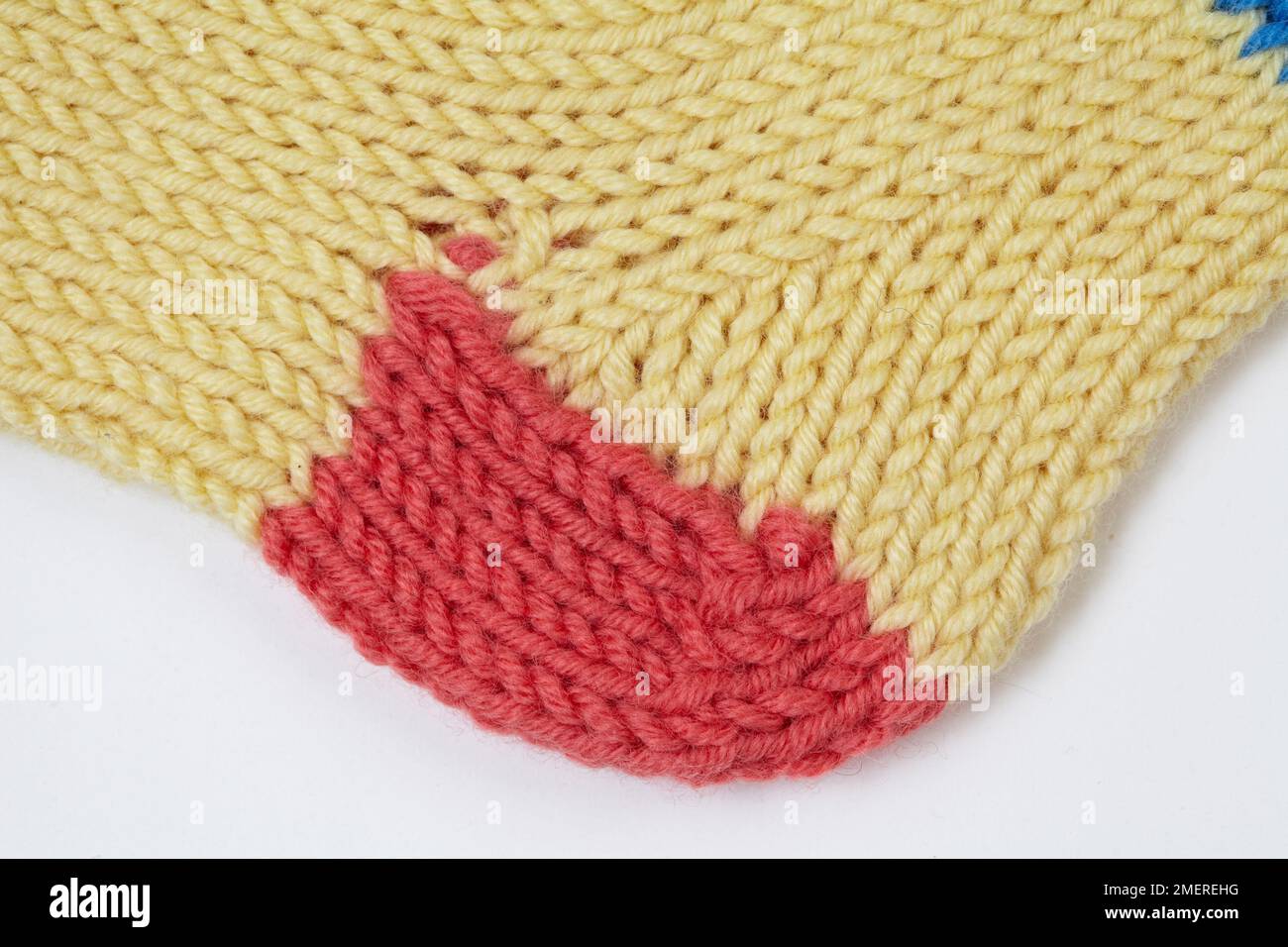 Tacco rosso di calzino lavorato a maglia Foto Stock