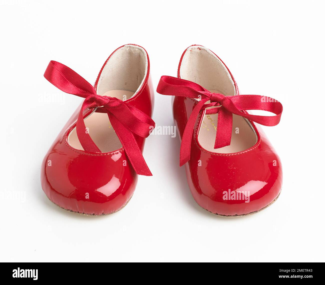 Il brevetto rosso lacci scarpe Foto Stock
