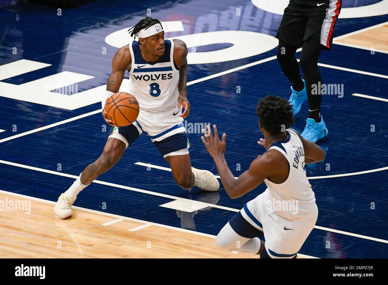 Minnesota Timberwolves forward Jarred Vanderbilt (8) grabs a rebound  against the Portland Trail Blazers during the first half of an NBA  basketball game Sunday, March 14, 2021, in Minneapolis. (AP Photo/Craig  Lassig