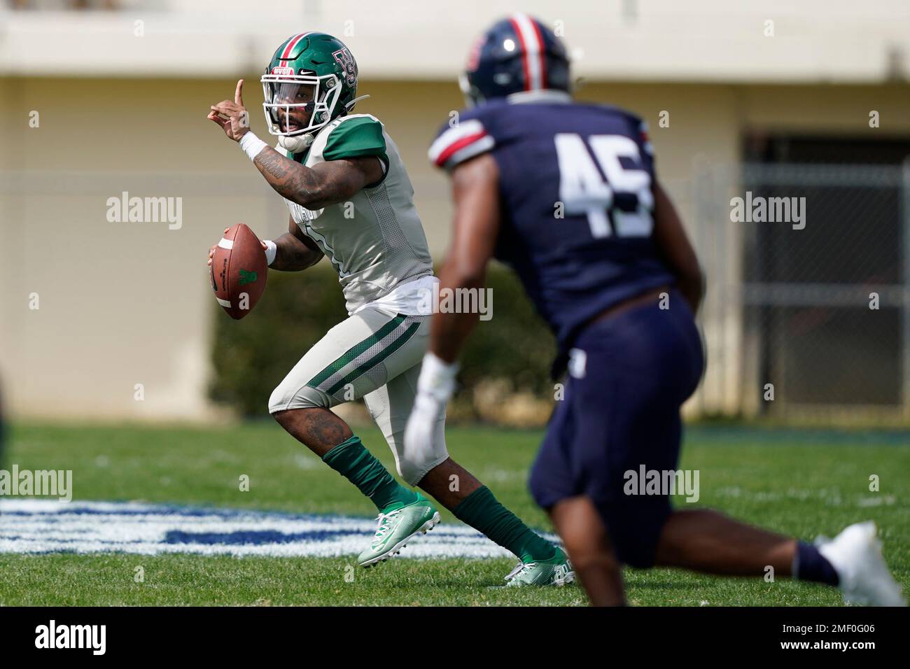 Mississippi Valley State quarterback Jalani Eason (1) attempts to pass against Jackson State linebacker Aubrey Miller Jr., (45) during the second half of an NCAA college football game, Sunday, March 14, 2021, in Jackson, Miss. (AP Photo/Rogelio V. Solis) Foto Stock