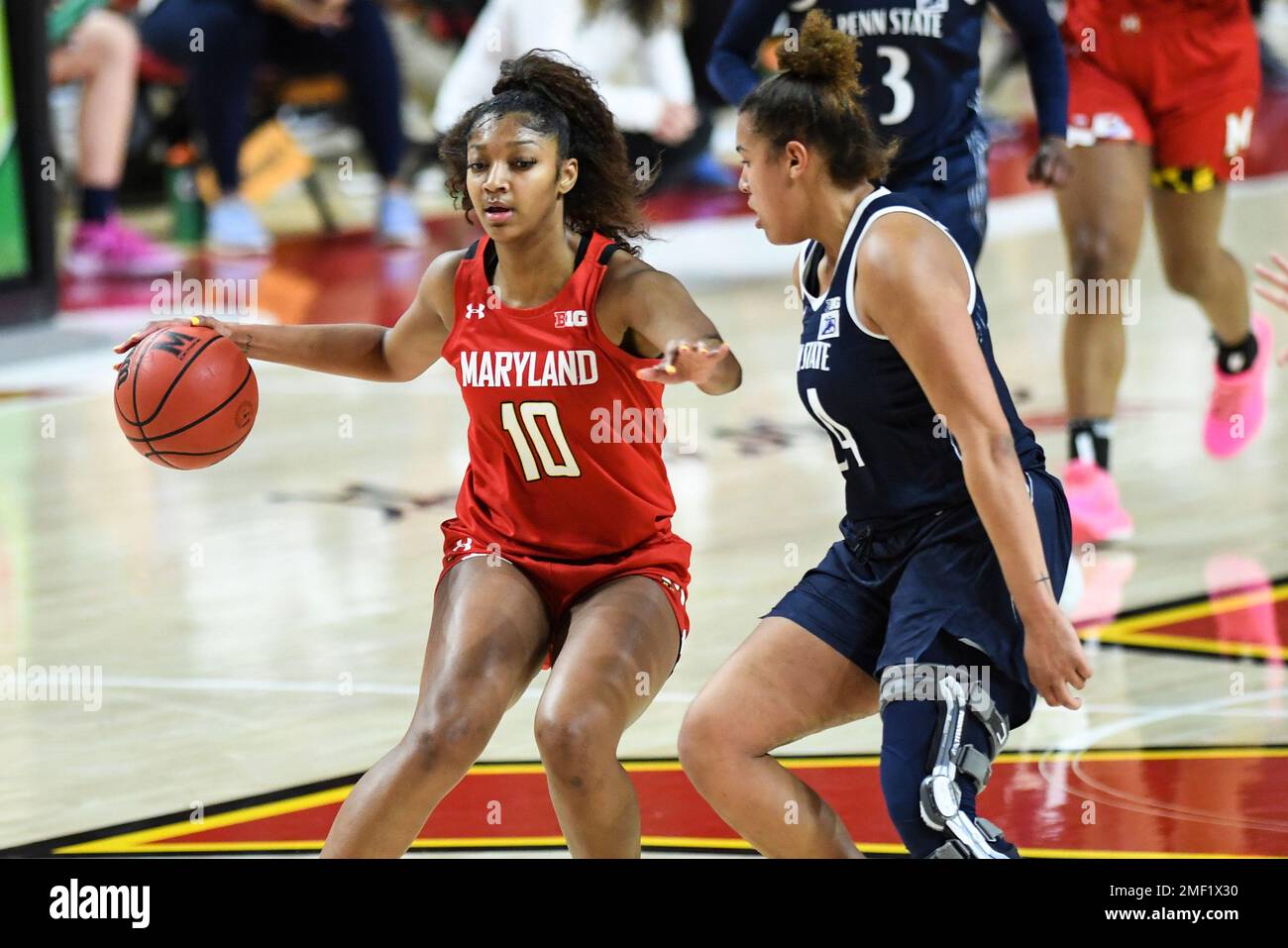 Maryland forward Angel Reese (10) brings the ball up court against Penn  State guard Nan Garcia (24) during the second half of an NCAA college  basketball game Saturday, March 6, 2021, in