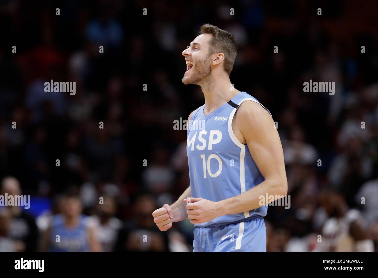 Minnesota Timberwolves forward Jake Layman (10) celebrates in the final seconds of the second half of an NBA basketball game against the Miami Heat, Wednesday, Feb. 26, 2020, in Miami. (AP Photo/Wilfredo Lee) Foto Stock