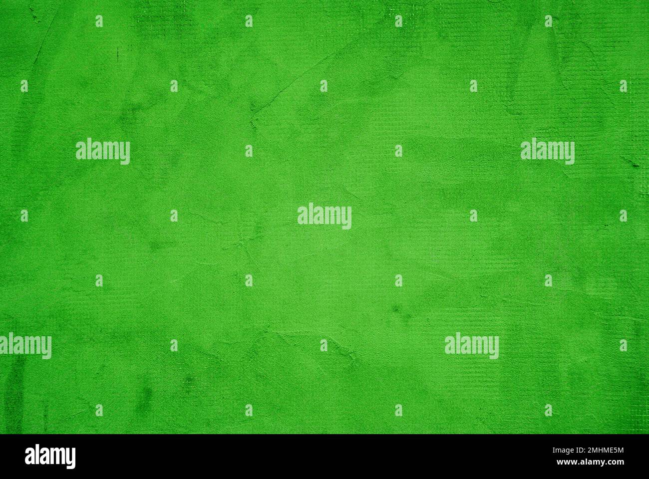 Una vecchia parete di cemento di colore verde sfondo texture. Foto Stock