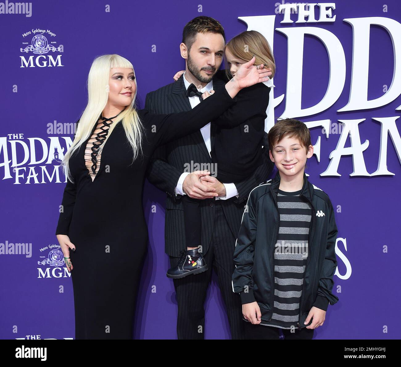 Christina Aguilera arrives with, from left, her husband Matthew Rutler, Summer Rain Rutler and Max Bratman at the Los Angeles premiere of "The Addams Family" at Westfield Century City on Sunday, Oct. 6, 2019. (Photo by Jordan Strauss/Invision/AP) Foto Stock