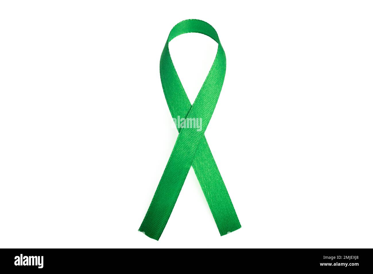 Nastro verde simbolo del cancro per lo spazio di copia Foto Stock