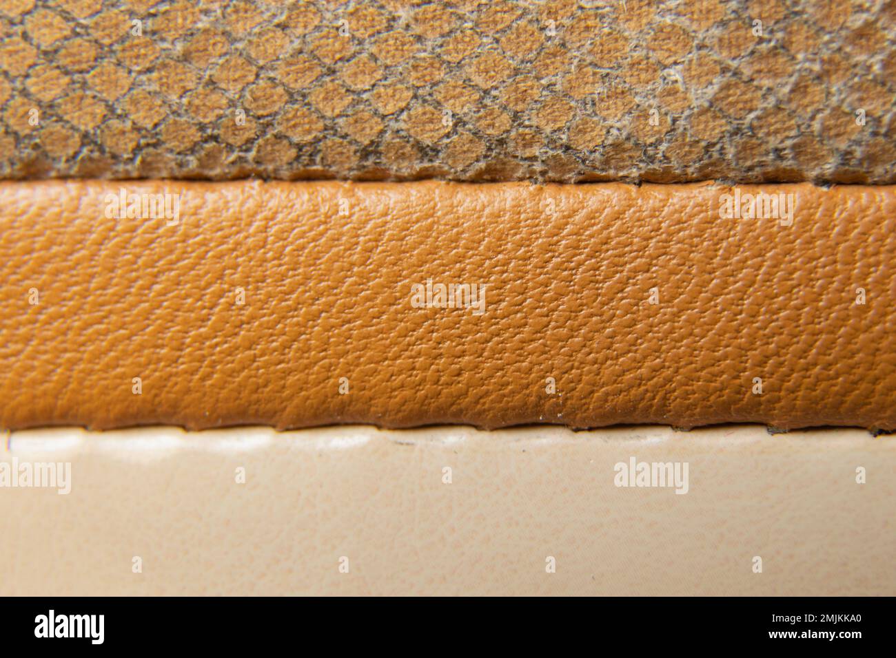 tre strisce cucite di tessuto beige come sfondo di sfumature diverse closeup Foto Stock
