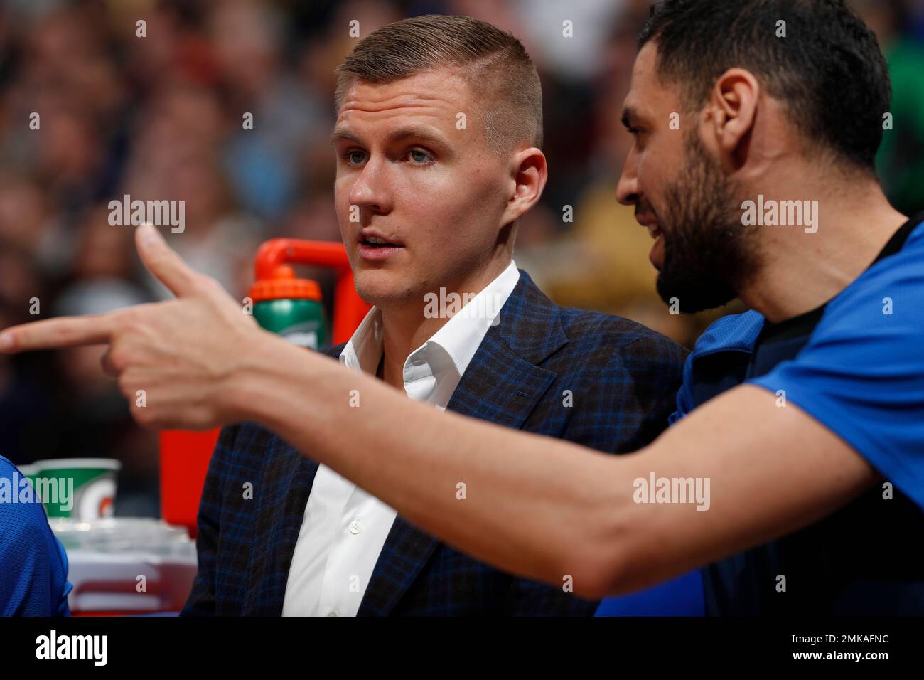 Dallas Mavericks forward Kristaps Porzingis (6) and Dallas Mavericks center Salah Mejri (50) in the second half of an NBA basketball game Thursday, March 14, 2019, in Denver. The Nuggets won 100-99. (AP Photo/David Zalubowski) Foto Stock