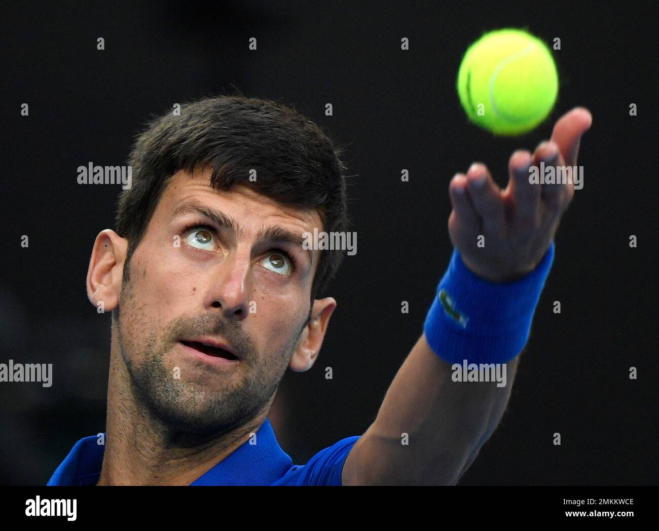 Serbia's Novak Djokovic serves to Spain's Rafael Nadal during the men's singles final at the Australian Open tennis championships in Melbourne, Australia, Sunday, Jan. 27, 2019. (AP Photo/Andy Brownbill) Foto Stock