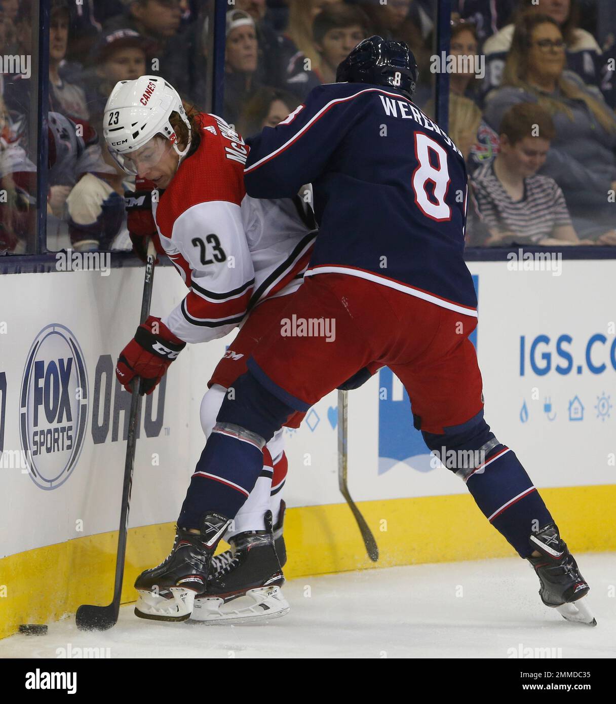 Carolina Hurricanes' Brock McGinn, left, controls the puck as Columbus Blue Jackets' Zach Werenski defends during the first period of an NHL hockey game Friday, Oct. 5, 2018, in Columbus, Ohio. (AP Photo/Jay LaPrete) Foto Stock