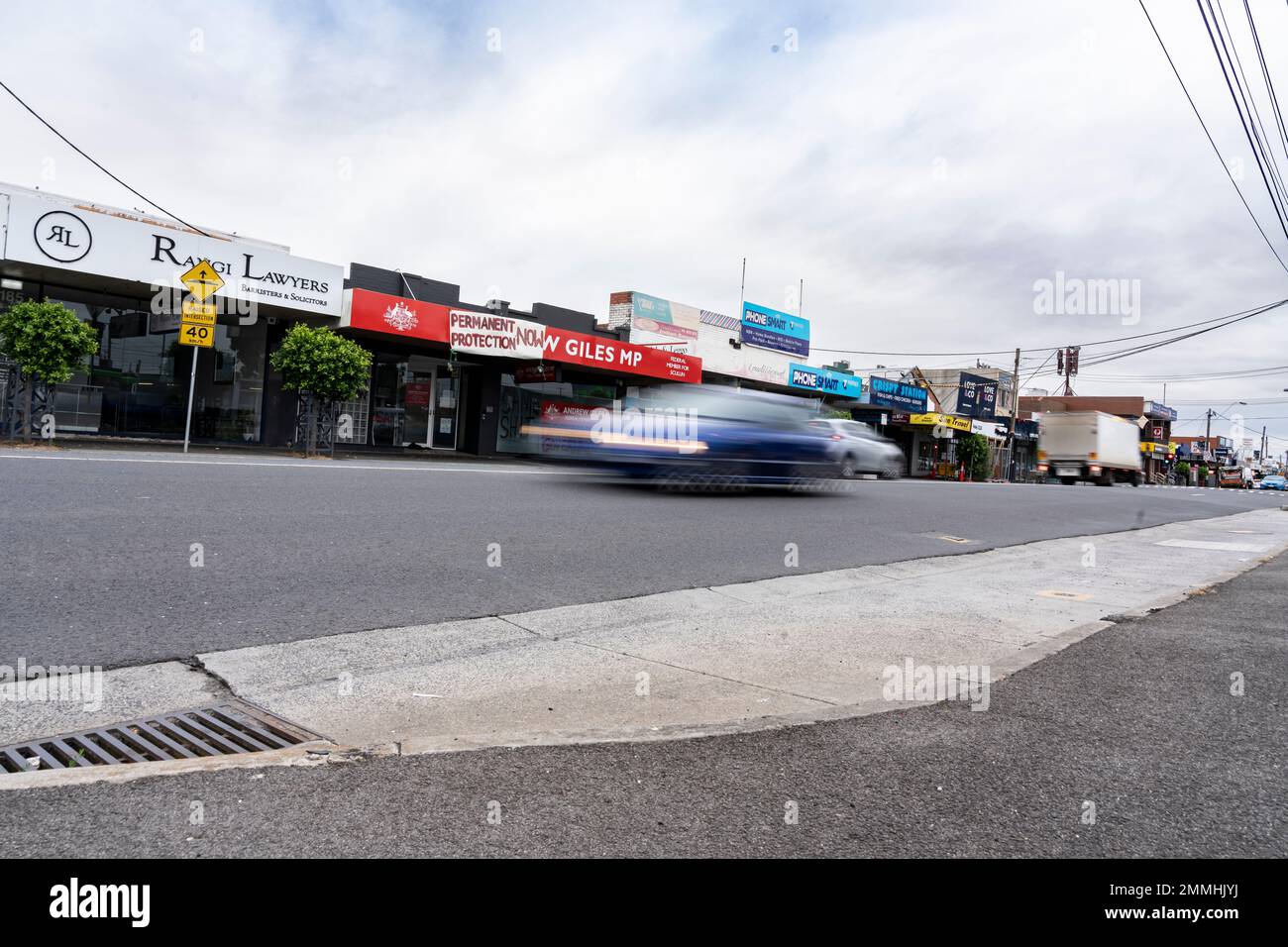 I manifestanti dei diritti dei rifugiati si rivolgono a Andrew Giles Foto Stock