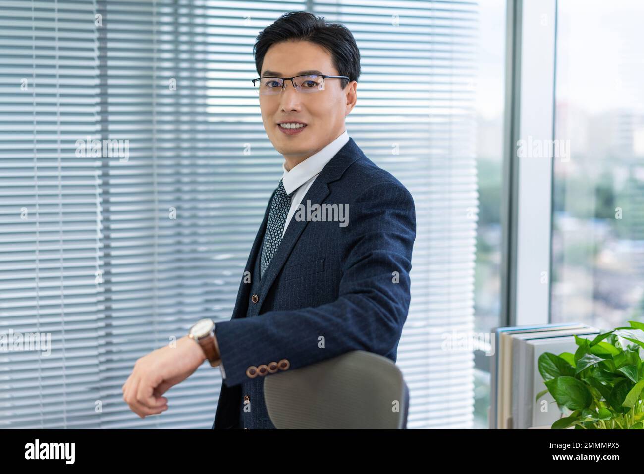 Un giovane uomo di affari Foto Stock