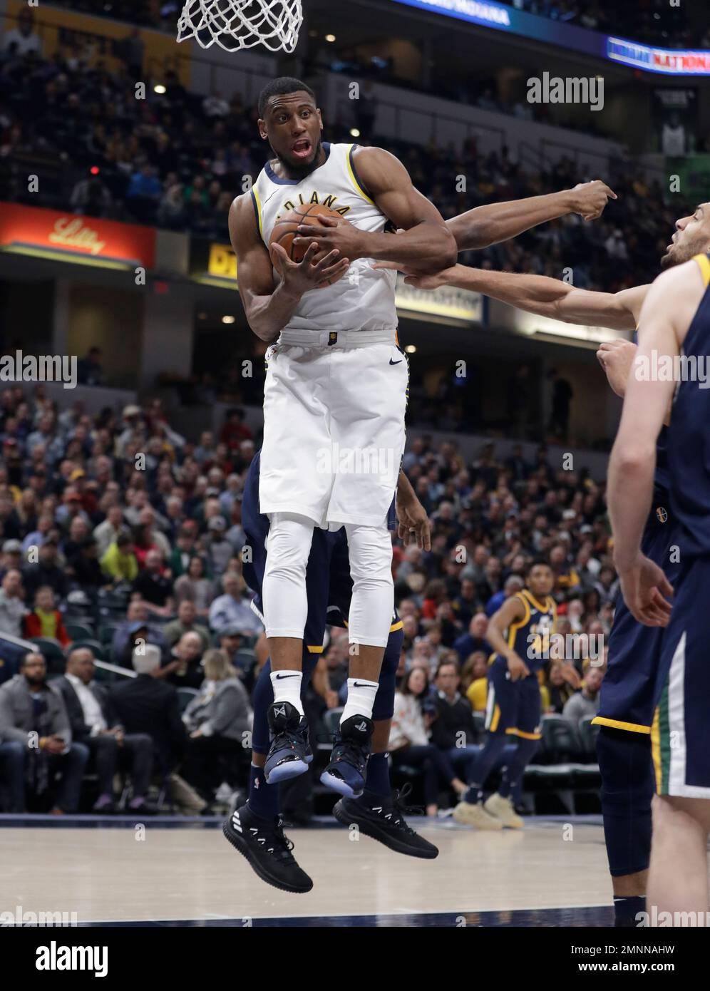 Indiana Pacers' Thaddeus Young (21) grabs a rebound during the first half of an NBA basketball game against the Utah Jazz, Wednesday, March 7, 2018, in Indianapolis. (AP Photo/Darron Cummings) Foto Stock