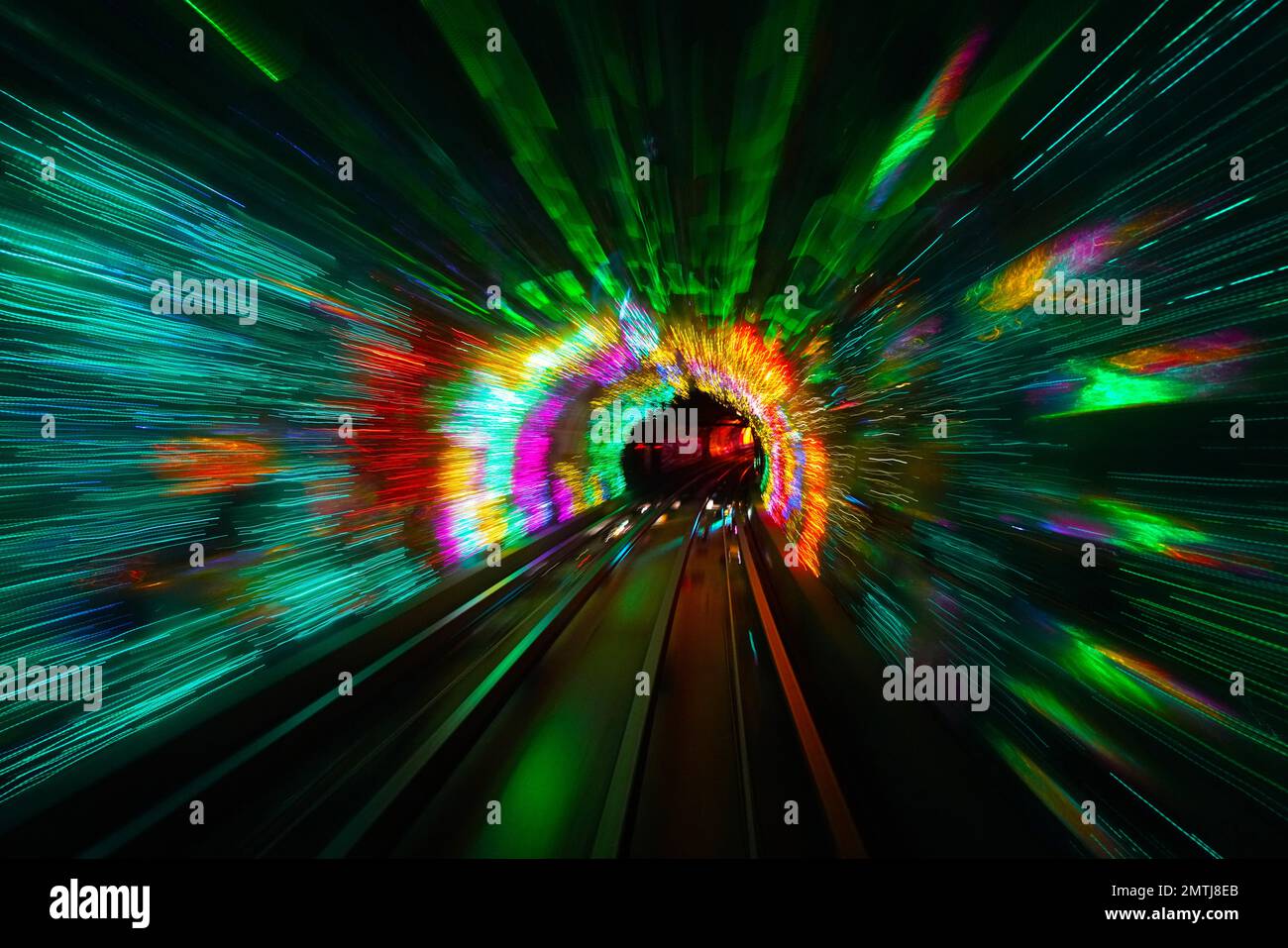 Guida attraverso un tunnel di luci Foto Stock