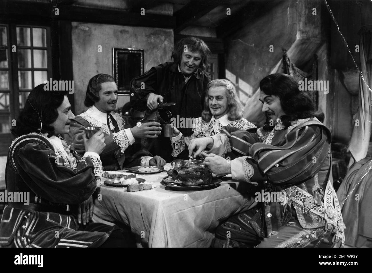 Les Trois Mousquetaires anno: 1953 - Francia / Italia Direttore: André Hunebelle Bourvil, Jacques François , Gino Cervi, Georges Marchal, Jean Martinelli Foto Stock
