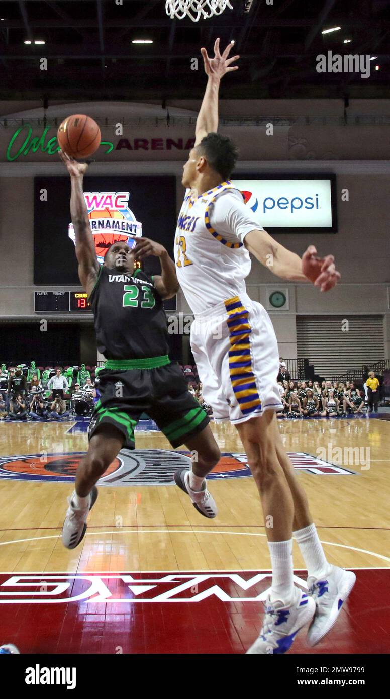 Utah Valley guard Brandon Randolph (23) elevates for a shot over Cal