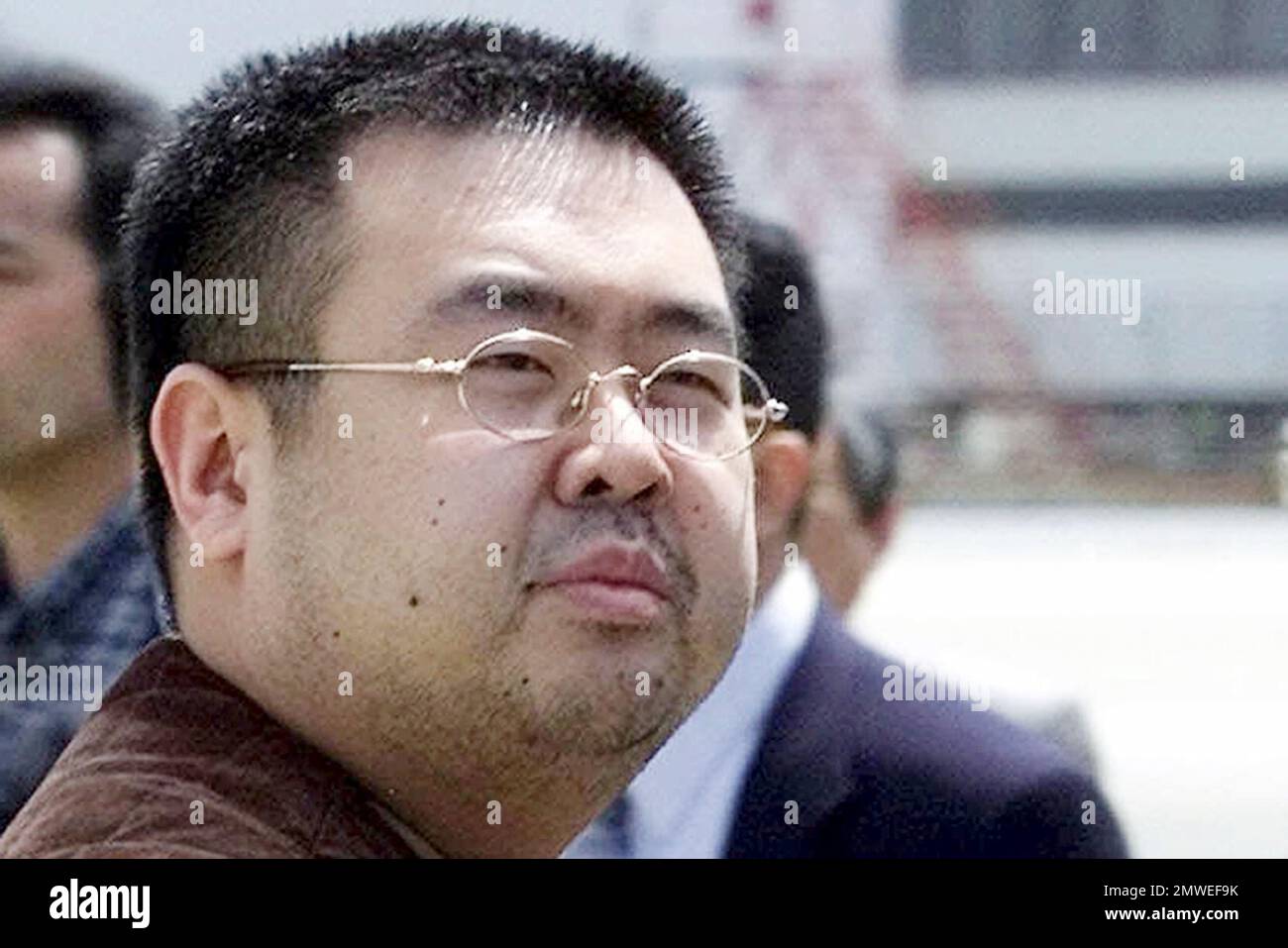 FILE - This May 4, 2001, file photo shows Kim Jong Nam, exiled half-brother of North Korea's leader Kim Jong Un, in Narita, Japan. Kim Jong Nam, 46, was assassinated Monday, Feb. 13, 2017, in a shopping concourse at Kuala Lumpur International Airport, Malaysia, according to a Malaysian government official. (AP Photos/Shizuo Kambayashi, File) Foto Stock