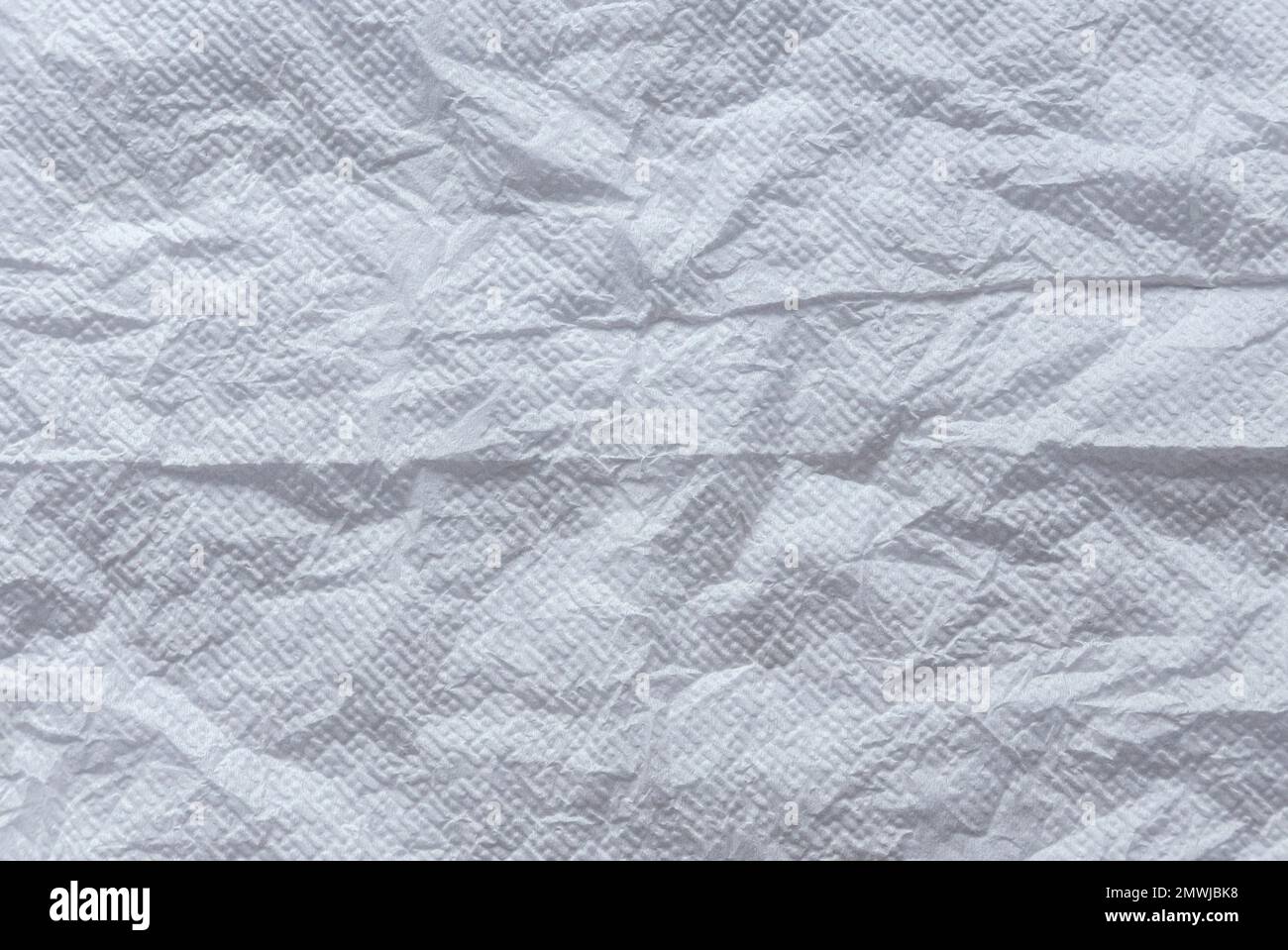 Sfondo e struttura del tessuto briciolato bianco. Foto Stock