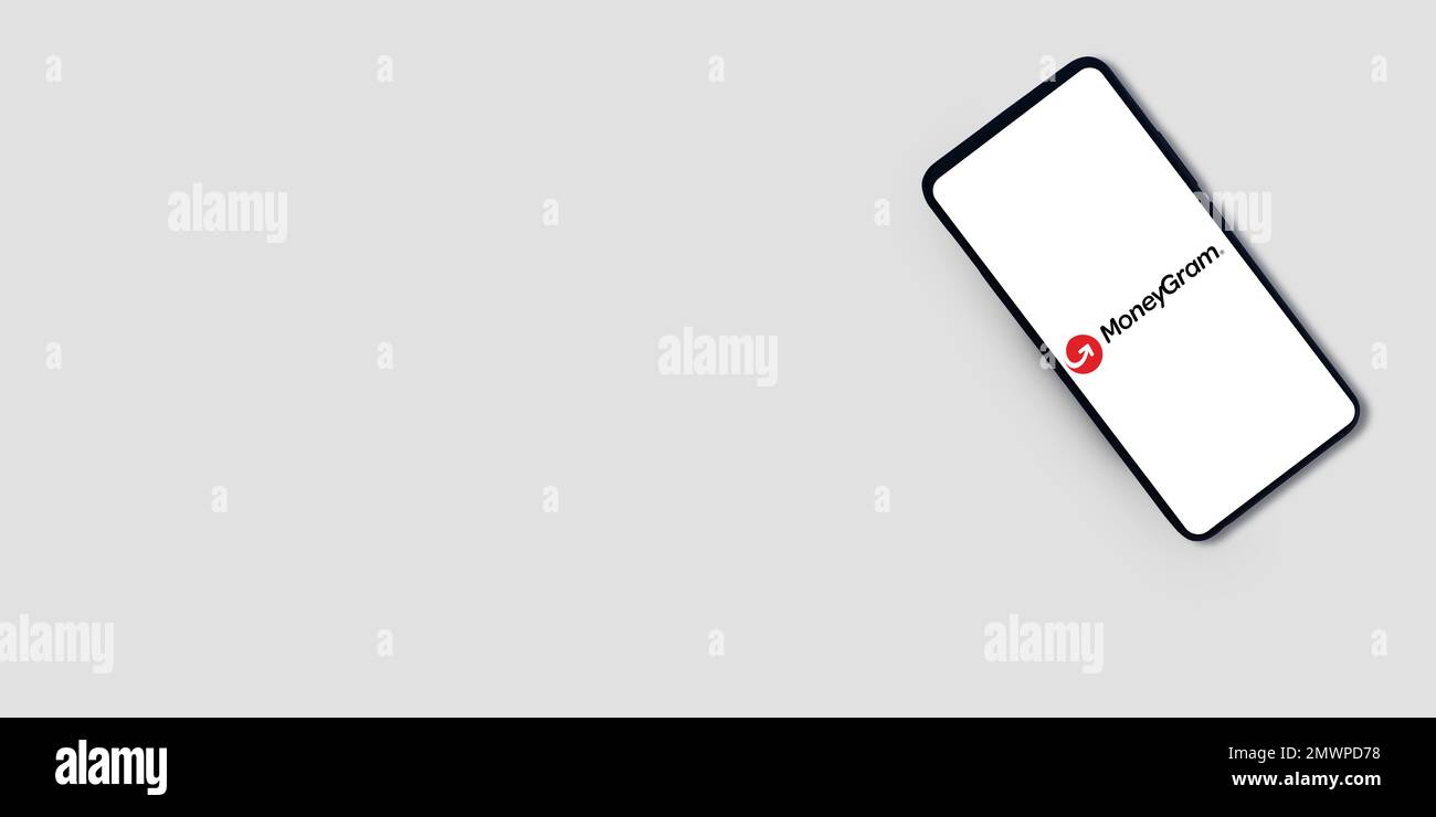 30,1, Pakistan. MoneyGram sullo schermo mobile con spazio vuoto banner sfondo editoriale Foto Stock