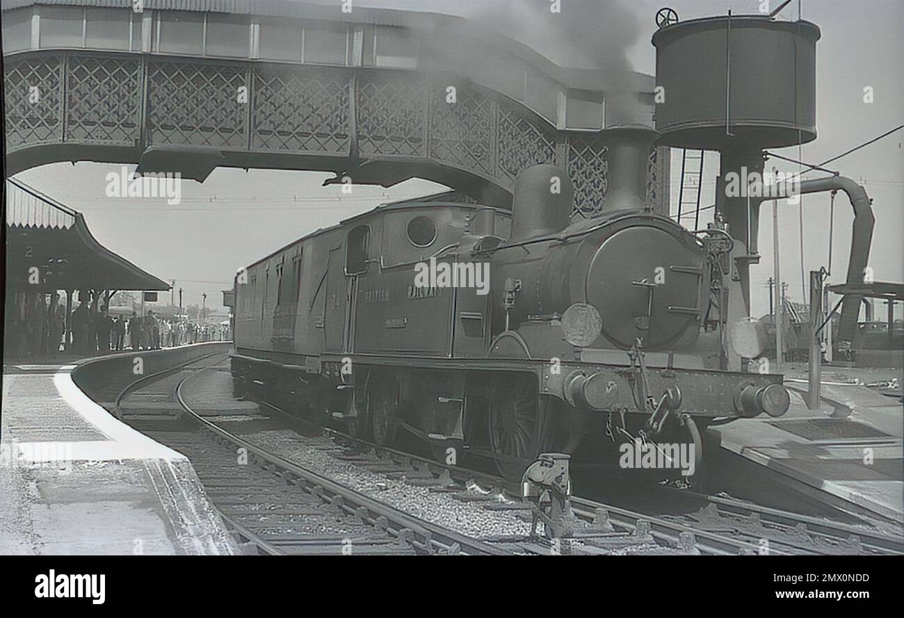 Ex locomotiva LSWR O2 Classe 0-4-4T No.201 come W34 'Newport' sull'isola di Wight tra il 1947 e il 1955 Foto Stock