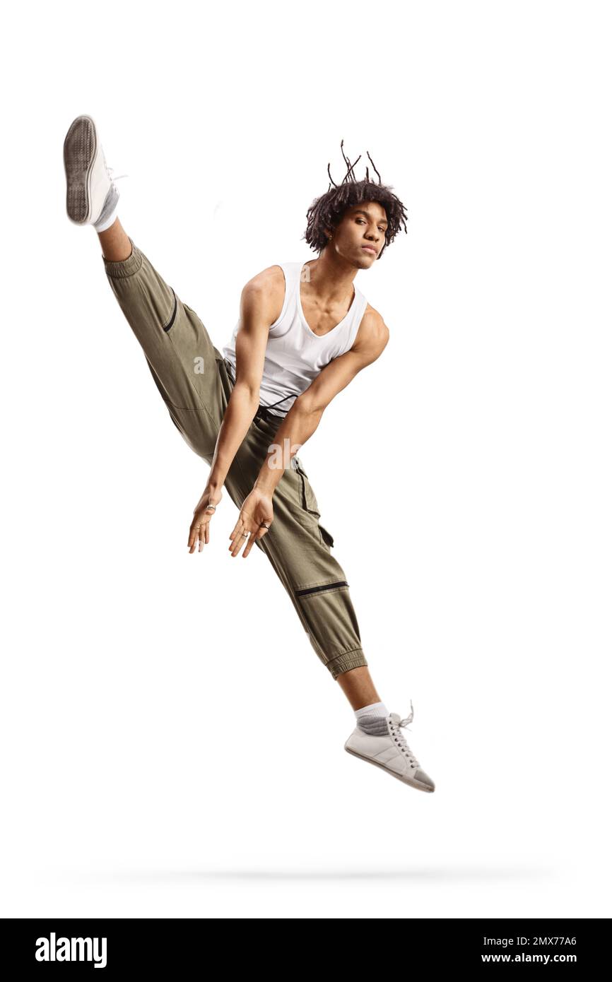 L'uomo afroamericano esegue un salto separato isolato su sfondo bianco Foto Stock