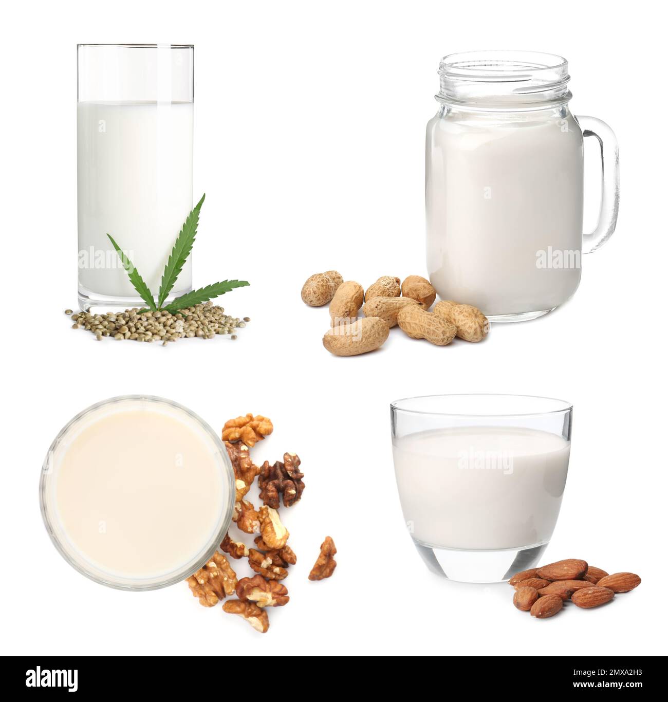 Impostare con diversi tipi di latte biologico su sfondo bianco. Bevande naturali Foto Stock