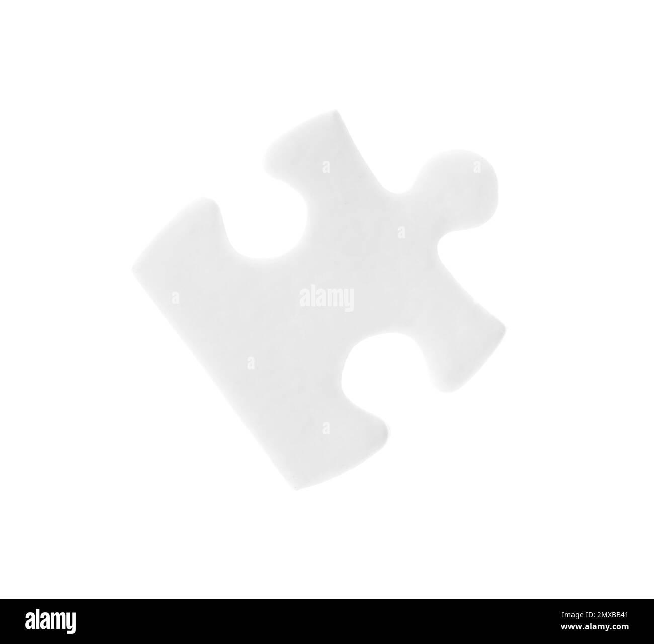 Un pezzo di puzzle vuoto isolato su bianco Foto Stock