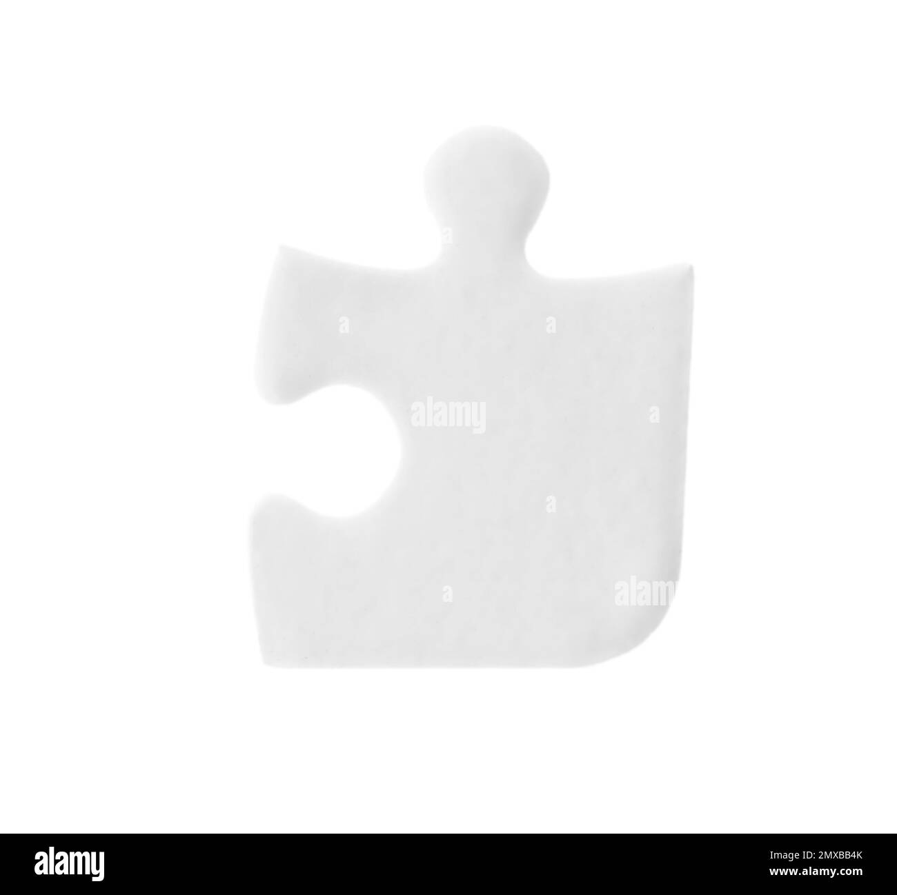 Un pezzo di puzzle vuoto isolato su bianco Foto Stock