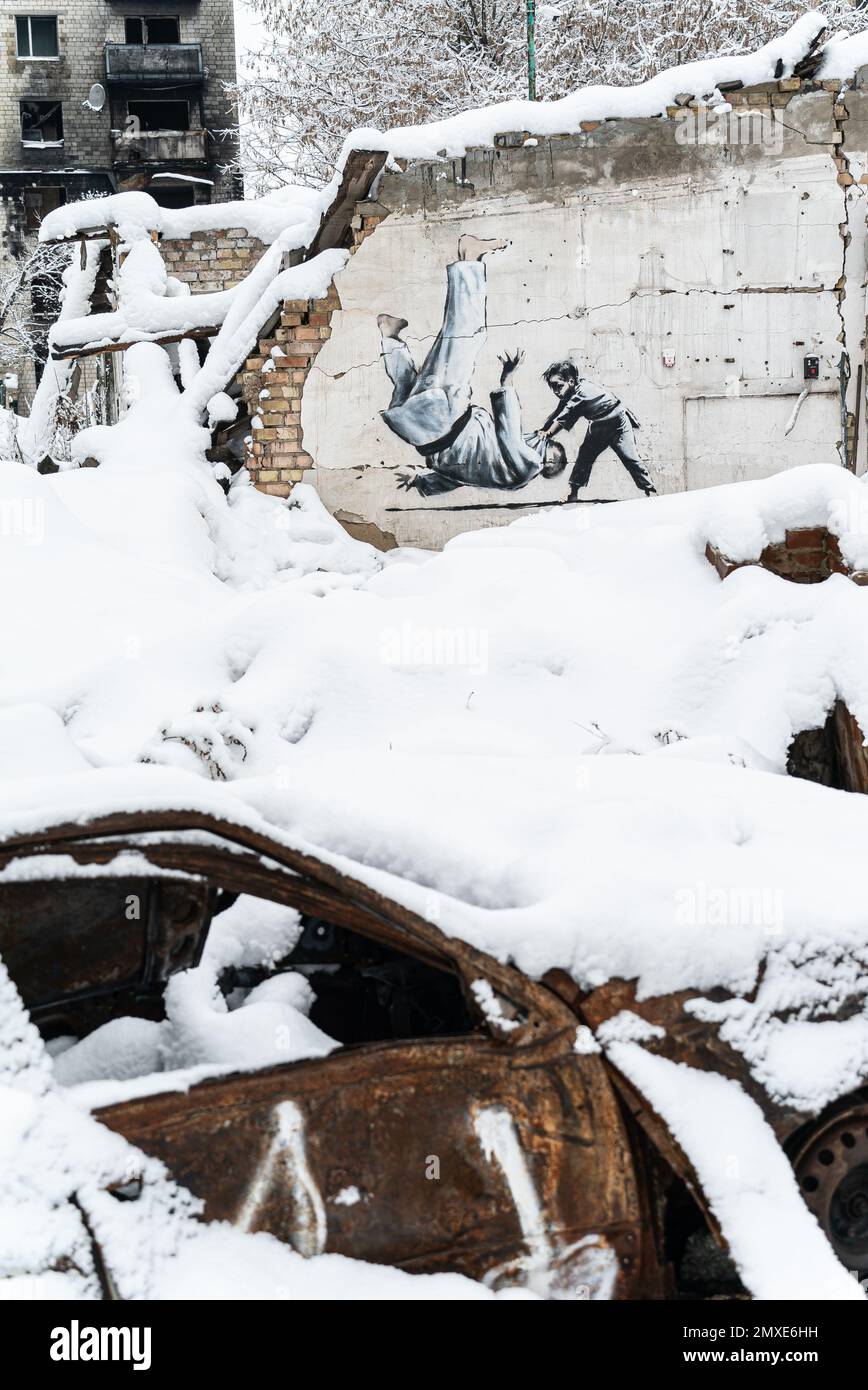 Ucraina, Borodyanka - graffiti Banksy sul muro Foto Stock
