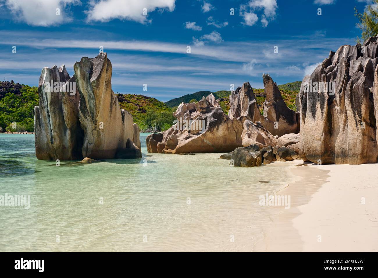 Formazione rocciosa sulla spiaggia dell'isola di Curieuse, Isola di Prasiln, Seychelles Foto Stock